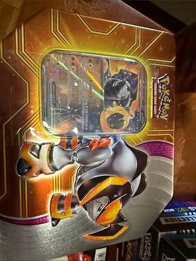 Pokemon Tin with Orange, Gold, Silver Artwork